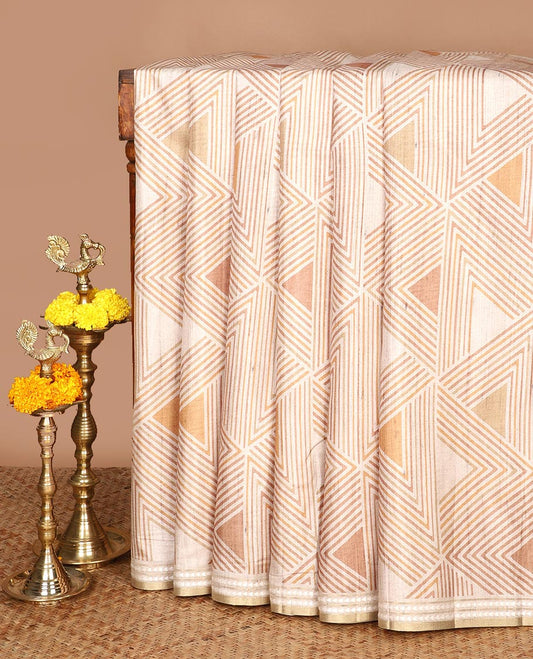 Chikku color with brown block geometric print fancy tussar silk saree with zari resam border & block print pallu along striped blouse