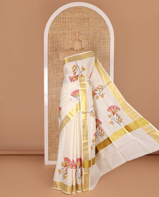 Cream and pink vertically striped with handblock floral motifs printed Kerala cotton saree, zari striped border, handblock floral printed pallu, and a matching blouse