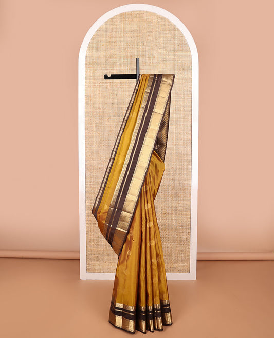 Mustard floral buttas vasundhara elite silk saree with contrast intricate zari design border & argyle design pallu