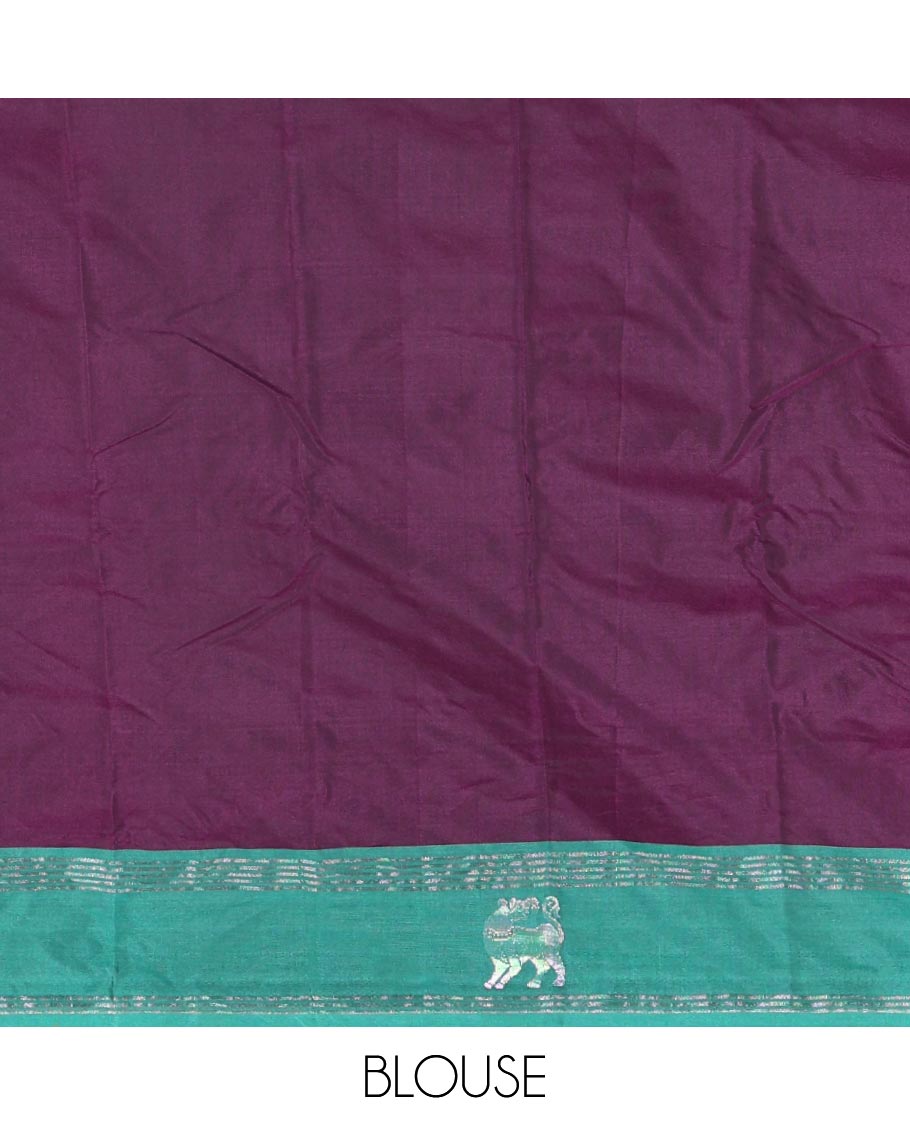 Purple zari buttas Kanchi silk saree, contrast yaali motifs zari green border, zari design pallu, and a matching blouse