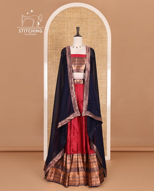 Red taffeta silk half saree, plain with contrast dark blue traditional zari big border, matching zari blouse, and contrast plain zari border dhavani