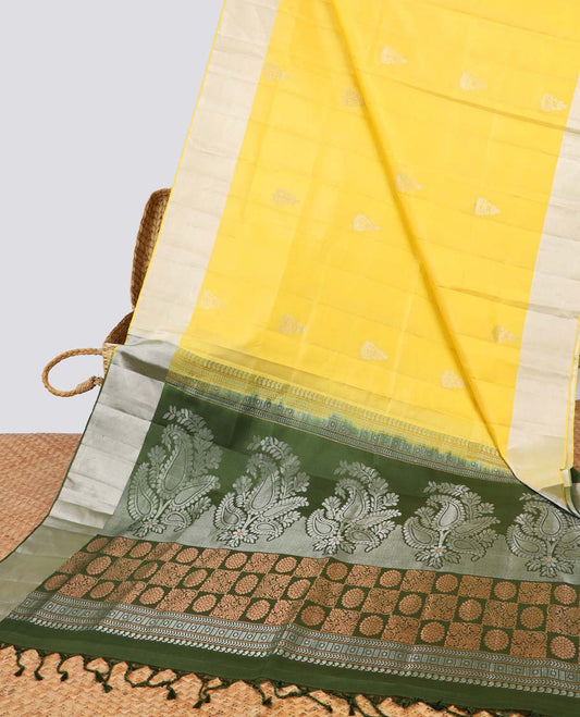 Yellow leaf buttas soft silk saree with contrast zari border & floral zari design pallu