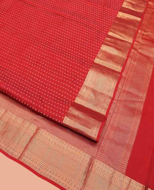 Red Vasundhara Lite Silk Mix Saree, Adorned with Zari Buttas All Over Its Body, Highlighted by Zari Border of Rudraksham, Banaras, Manga, and Mayil Kann Designs, Diagonally Striped Pallu, and Paired with a Matching Blouse