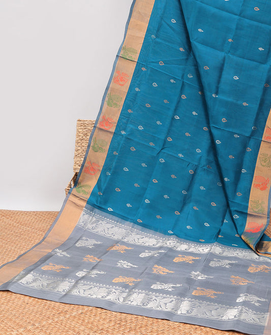 Blue floral buttas uppada silk saree with contrast peacocok buttas border & peacock buttas, floral design  pallu
