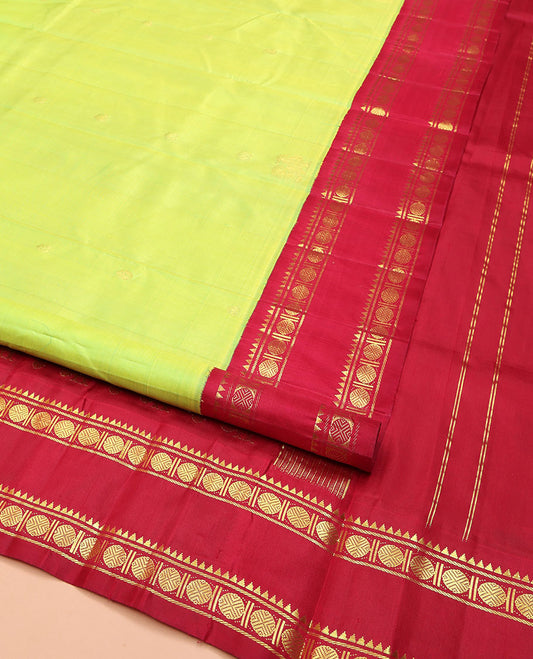 Parrot Green Kanchipuram Silk Saree, Adorned with Zari Buttas and Mayil Buttas on Its Body, Complemented by a Contrast One-Sided Korvai Border of Rekku, Banaras, and Rudraksham Designs, Pallu of Zari Designs, and Comes Without a Blouse