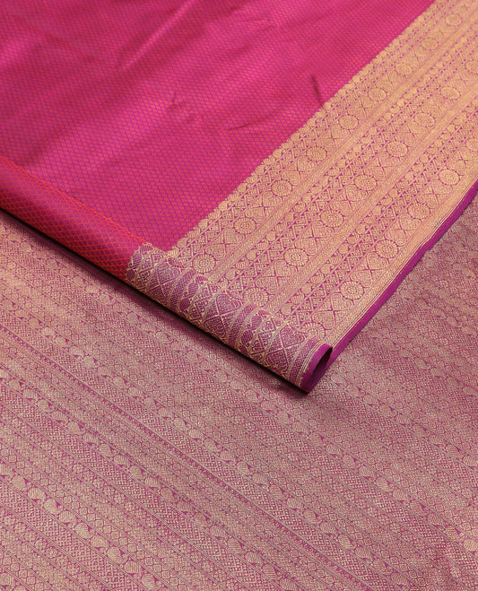 Magenta jaal design silk saree with self zari border of manga, poo chakram design & floral design pallu