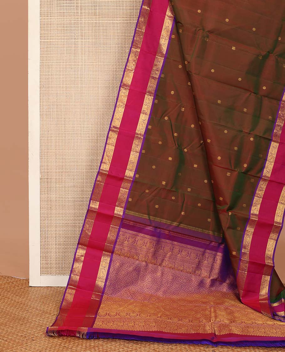 Maroon dual-tone mayil poun buttas Kanchipuram silk saree, contrast rettai pettu border of rekku, neli, mayil, and yaanai, designs, and jaal pallu