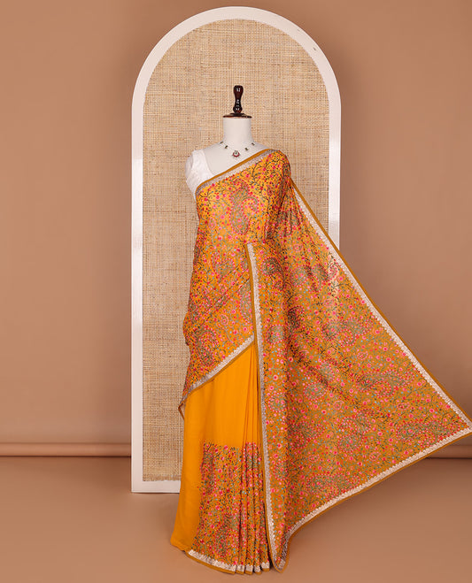Orange base colroful floral vine resham thread embroidered with stone work designer saree, micro-stone embroidery border
