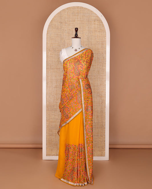 Orange base colroful floral vine resham thread embroidered with stone work designer saree, micro-stone embroidery border