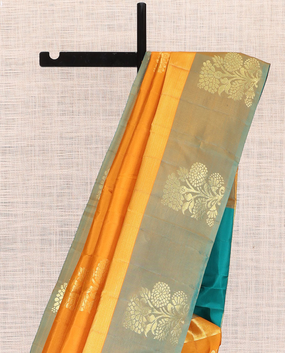 Orange Kanchipuram Silk Saree, Woven with Floral Zari Buttas, a Contrast Floral Zari Design Border, Floral Design Pallu, and a Contrast Blouse
