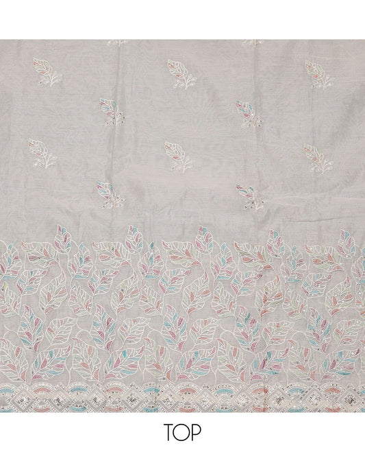 Cream material churidar set, leaf motifs embroidered top, plain bottom, and a sequins embroidered dupatta