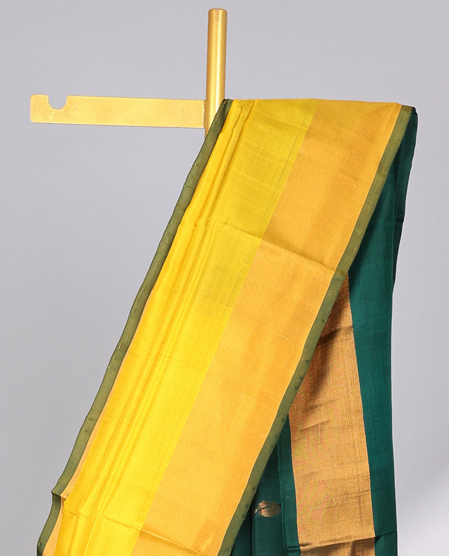 Yellow uppada silk saree with contrast plain border & floral buttas pallu