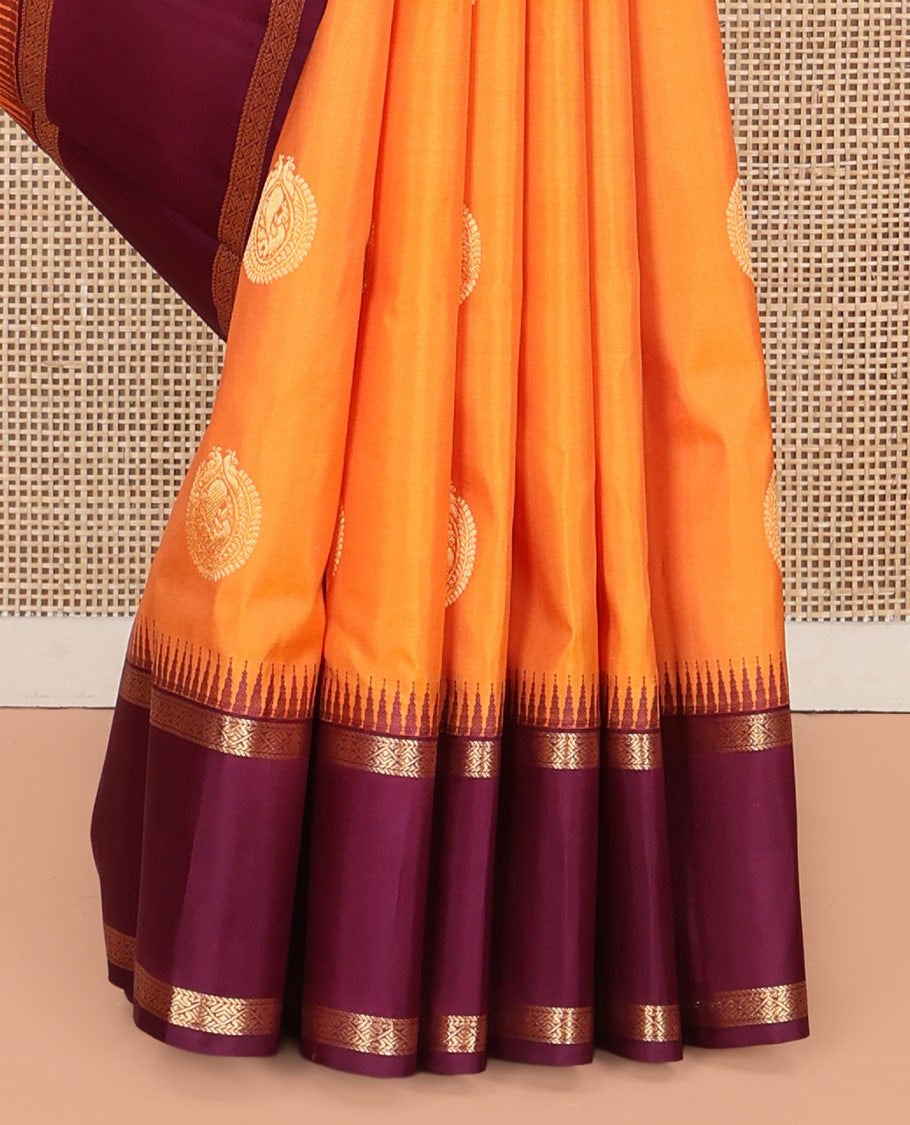 Orange Vasundhara Silk Saree, Delicately Woven with Zari Buttas All Over Its Body, Complemented by a Contrast Rettai Pettu Temple Border of Zari Designs, Grand Jaal Pallu, and Paired with a Contrast Blouse