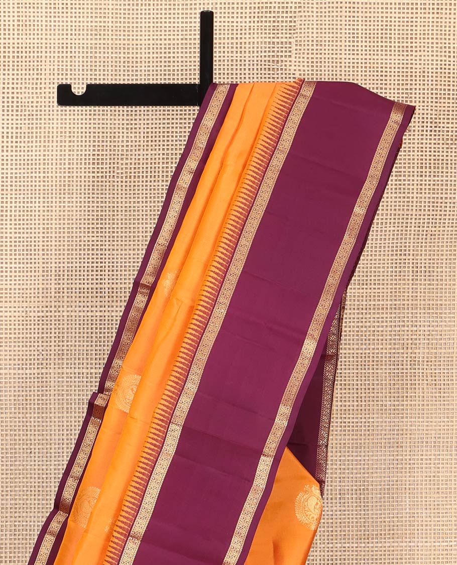 Orange Vasundhara Silk Saree, Delicately Woven with Zari Buttas All Over Its Body, Complemented by a Contrast Rettai Pettu Temple Border of Zari Designs, Grand Jaal Pallu, and Paired with a Contrast Blouse