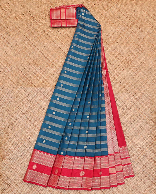 Blue Budget Silk Saree, Elevated with Zari Buttas and Stripes All Over Its Body, Complemented by Captivating Contrast Traditional Zari Designs Woven Border, Grand Jaal Pallu and Paired with a Contrast Blouse
