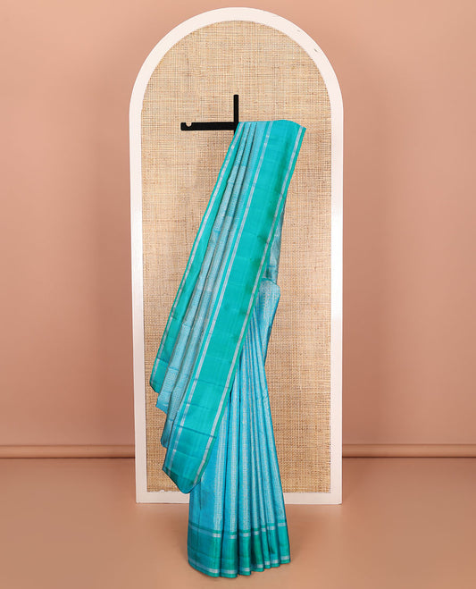 Blue striped Kanchipuram silk saree, contrast striped border, and pallu of stripes