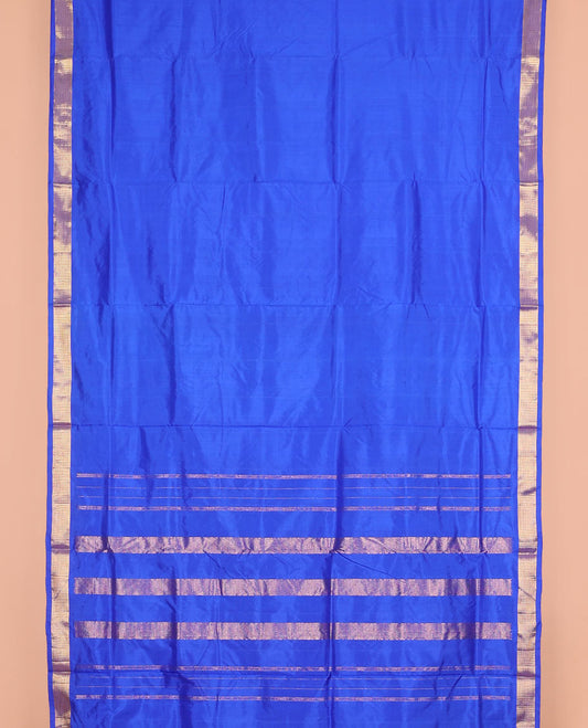 Royal blue plain nine-yard silk saree, zari border, and pallu of zari designs