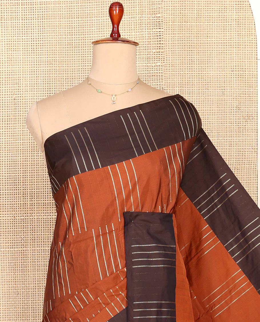 Brown Aarani Silk Saree, Subtly Enriched with Zari Stripes All Over Its Body, Complemented by a Contrast  Zari Stripes Border, Pallu of Stripes, and Paired with a Matching Blouse