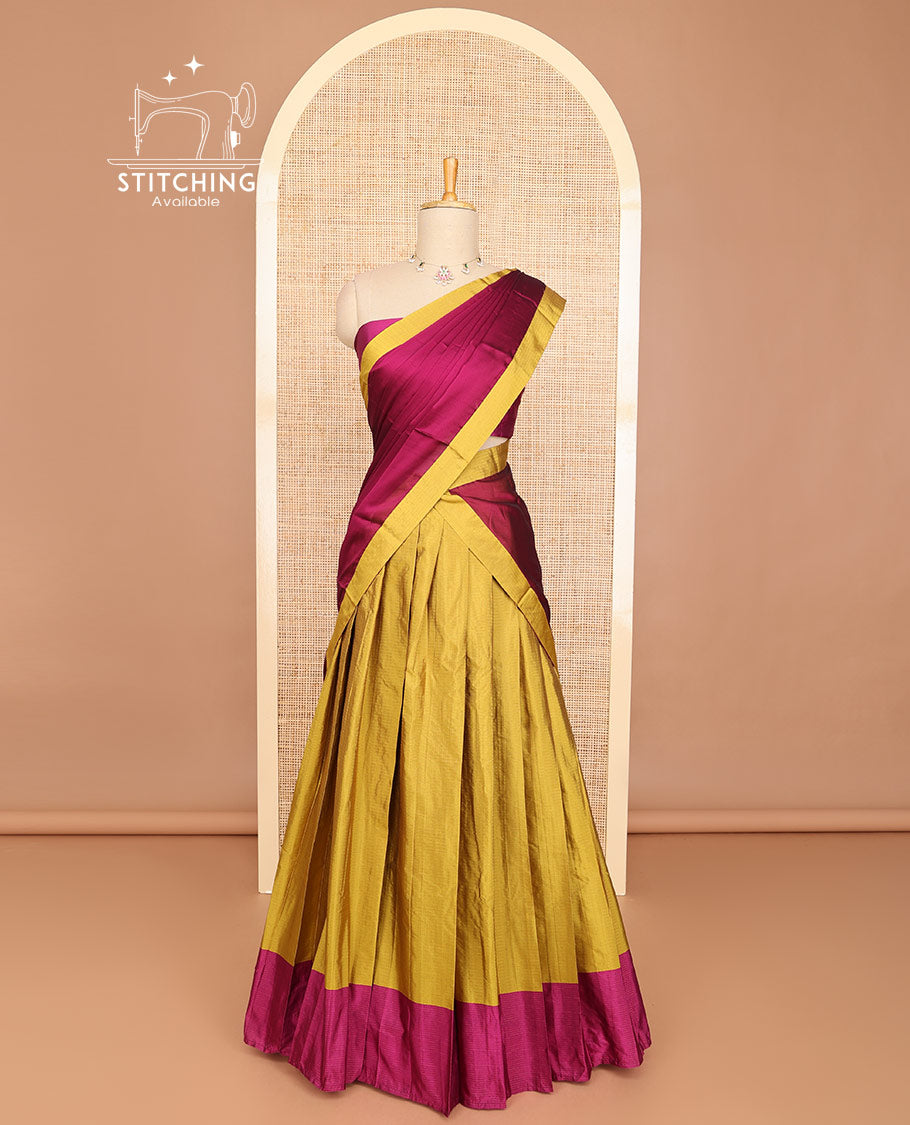 Mustard striped half saree with contrast border, plain blouse & plain, checked border dhavani