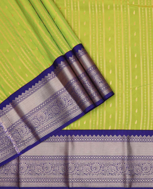 Green art silk pavadai material, zari design with contrast traditional zari border skirt, and contrast blouse