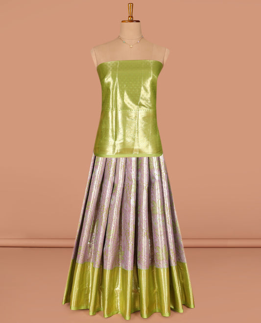 Pale Lavender Art Silk Pavadai Material Set, Ornamented with Jacquard Design on Its Skirt, Complemented by a Contrast Traditional Zari Design Woven Border, and Paired with a Contrast Jacquard Blouse