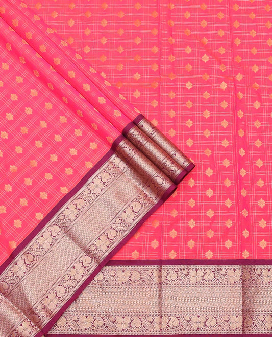 Pink Art Silk Pavadai Material Set, Subtly Enriched with Zari Butta Enclosed Checks on Its Skirt, Complemented by a Contrast Traditional Zari Design Border, and Paired with a Contrast Blouse