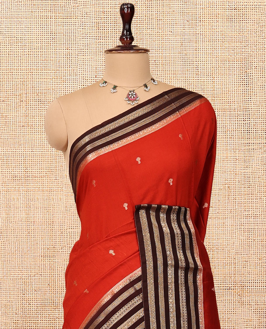 Rust Assam Silk Saree, Detailed with Zari Buttas, Complemented by a Contrast Traditional Zari Border, Striped Pallu, and a Contrast Blouse