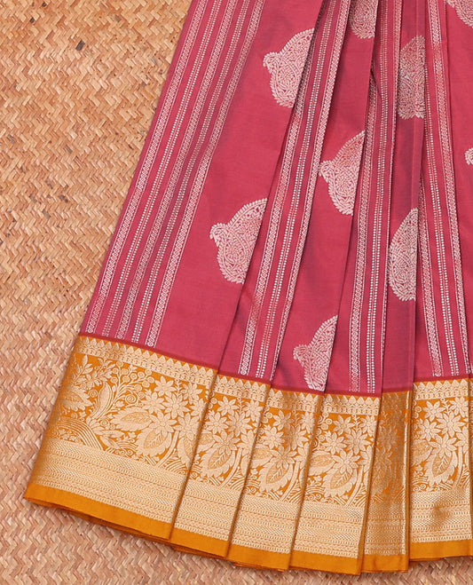 Pink striped and paisley buttas budget silk saree, contrast traditional zari design border, and pallu steeped with paisleys