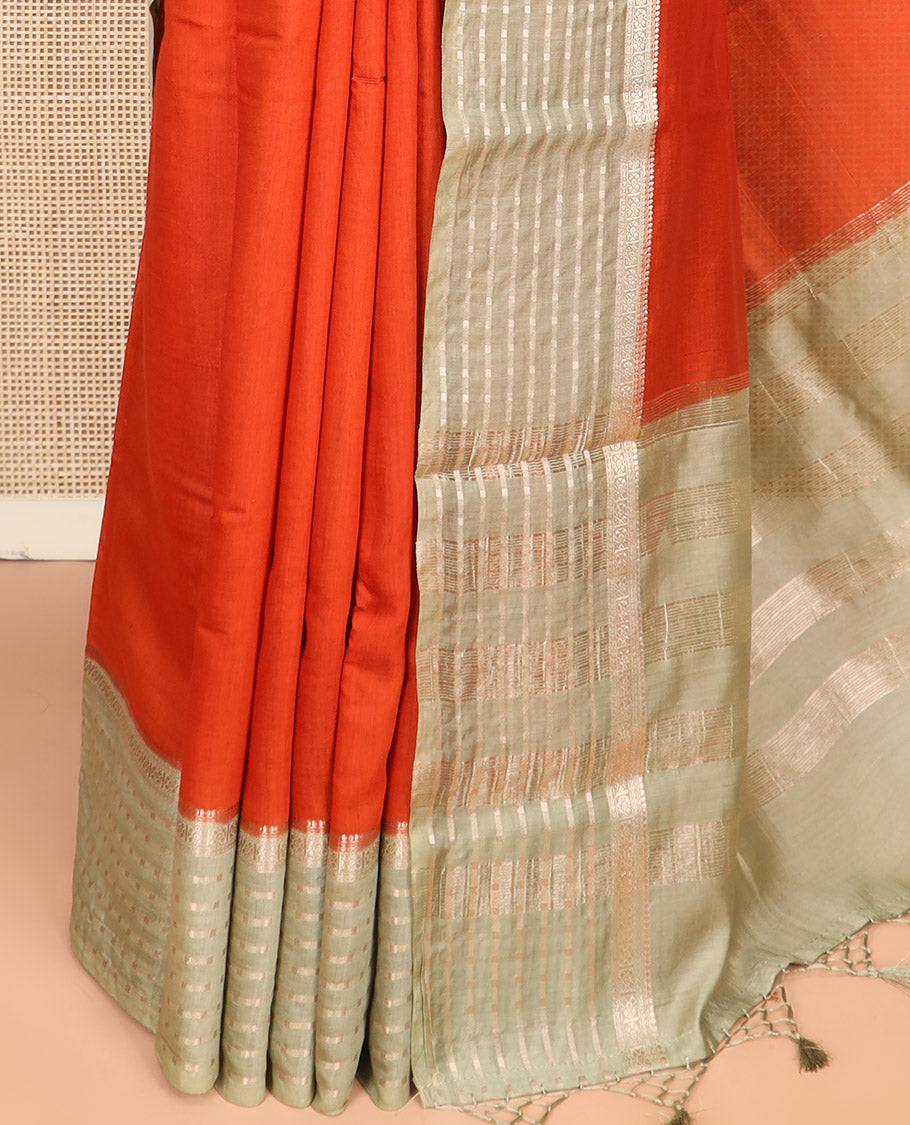 Sandal Plain Assam Silk Saree, Complemented by a Contrast Traditional Zari Design Border, Pallu Steeped with Zari Stripes, and Paired with a Contrast Blouse
