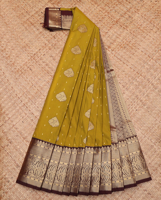 Green Budget Silk Saree, Beautified with Zari Buttas All Over Its Body, Complemented by a Contrast Traditional Zari Design Border, Gleaming Geometric-Patterned Pallu, and Paired with a Contrast Blouse