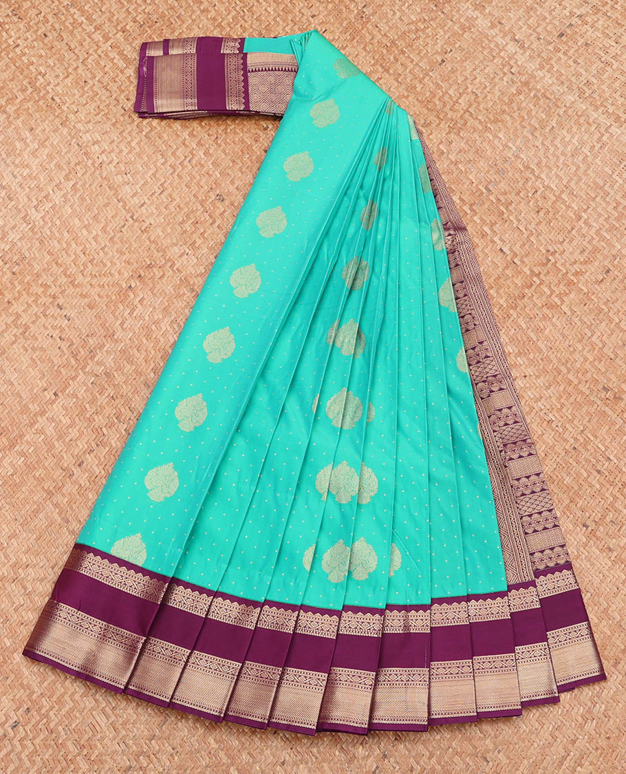Turquoise Budget Silk Saree Featuring Zari Buttas, Complemented by a Contrast Traditional Zari Design Rettai Pettu Border, Grand Pallu, and a Contrast Blouse