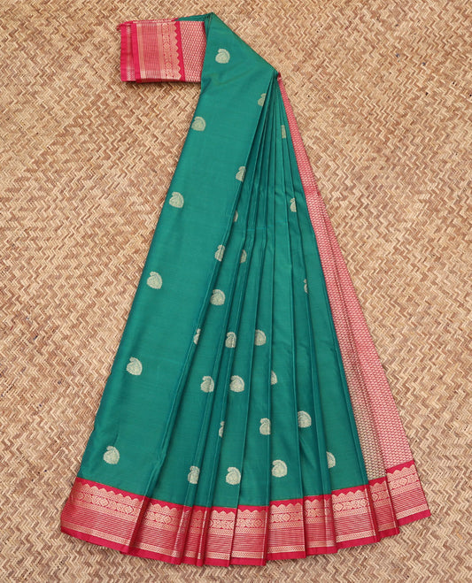 Green Budget Silk Saree, Beautifully Bedecked with Paisley Buttas All Over Its Body, Complemented by a Contrast Traditional Zari Design Border, Sparsely Woven Jaal Pallu, and Paired with a Contrast Blouse