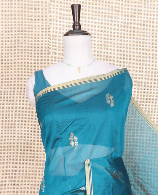 Blue Chanderi Cotton Saree, Decorated with Zari Buttas All Over Its Body, Highlighted by a Zari Piping Border, Pallu Steeped with Zari Buttas, and Paired with a Matching Blouse