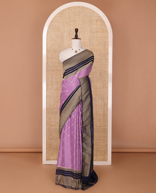 Purple jaal patterned fancy crepe saree, contrast traditional zari border & zari design pallu