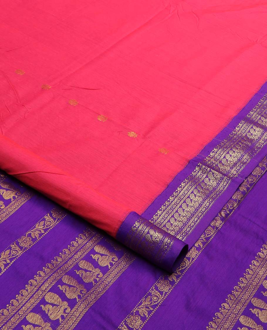 Red buttas nine-yard cotton saree, contrast traditional zari border, and pallu steeped with traditional motifs