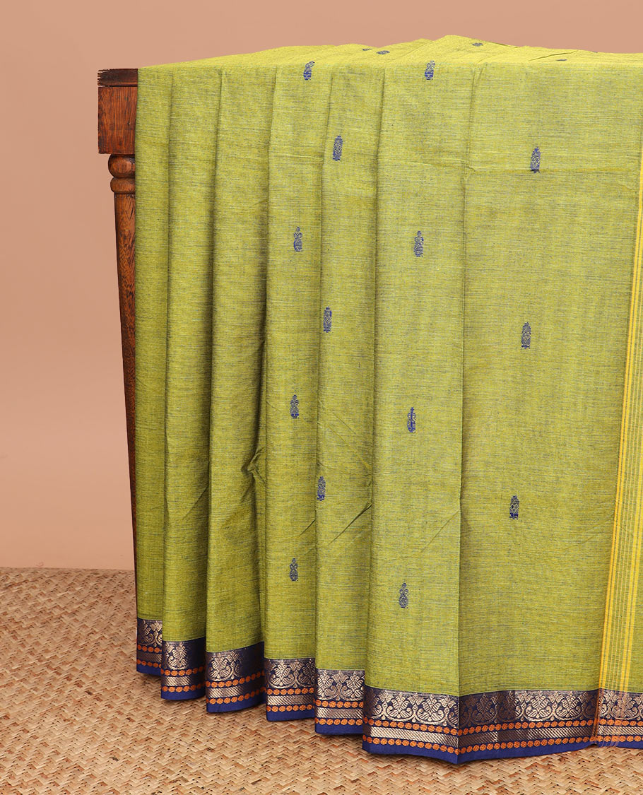Green buttas Chettinad cotton saree, contrast traditional design border, and striped pallu