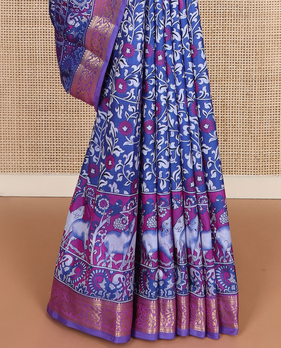 Royal blue floral vine patola silk saree, contrast traditional zari border and pallu of Pichwai cow and peacock motifs