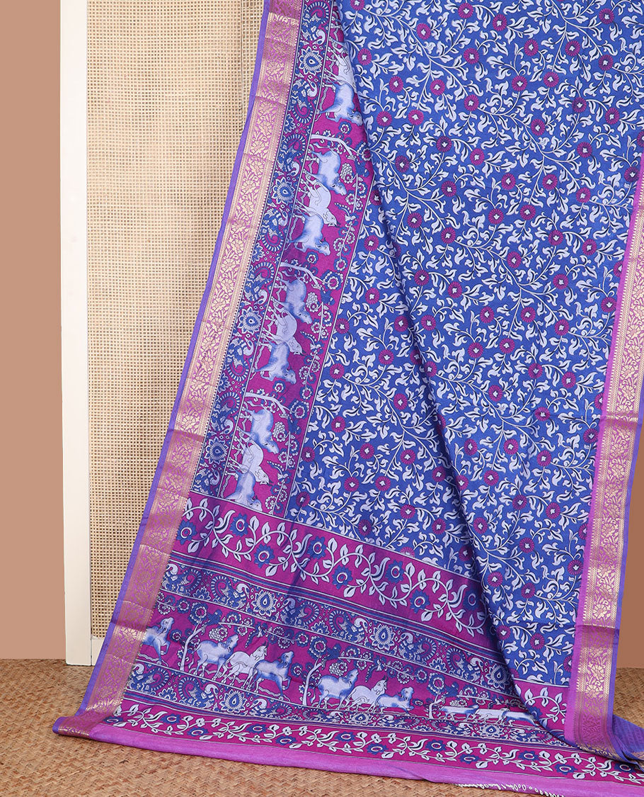 Royal blue floral vine patola silk saree, contrast traditional zari border and pallu of Pichwai cow and peacock motifs