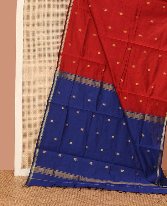 Red Maheshwari Cotton Saree, Gleamed Up with Flower Buttas All Over Its Body, Subtly Woven Piping Border, Captivating Contrast Pallu Steeped with Buttas, and Paired with a Contrast Blouse