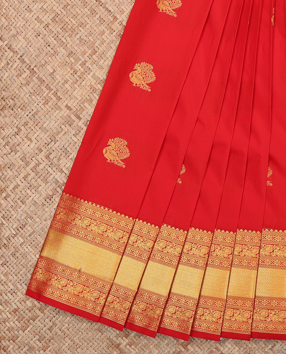 Red Budget Silk Saree, Gleamed Up with Zari Buttas on Its Body, Highlighted by a Zari Border of Traditional Designs, Grand Jaal Design Border, and Paired with a Matching Blouse
