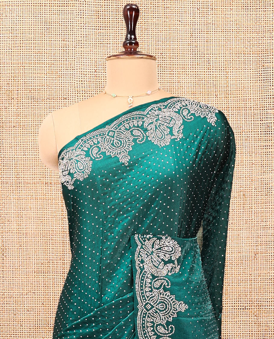 Green Designer Saree, Entralled with Stone Struck All Over Its Body, Highlighted by Peacock Stone Work Border, and Paired with a Matching Blouse