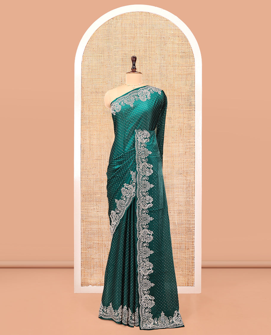 Green Designer Saree, Entralled with Stone Struck All Over Its Body, Highlighted by Peacock Stone Work Border, and Paired with a Matching Blouse