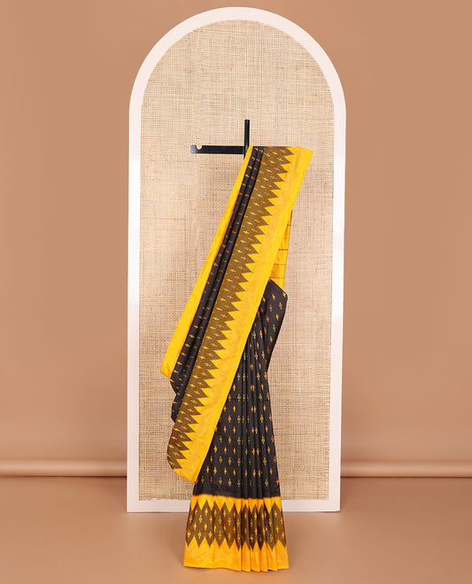 Black ikkat saree with ikkat buttas, contrast ikkat border & pallu of ikkat designs