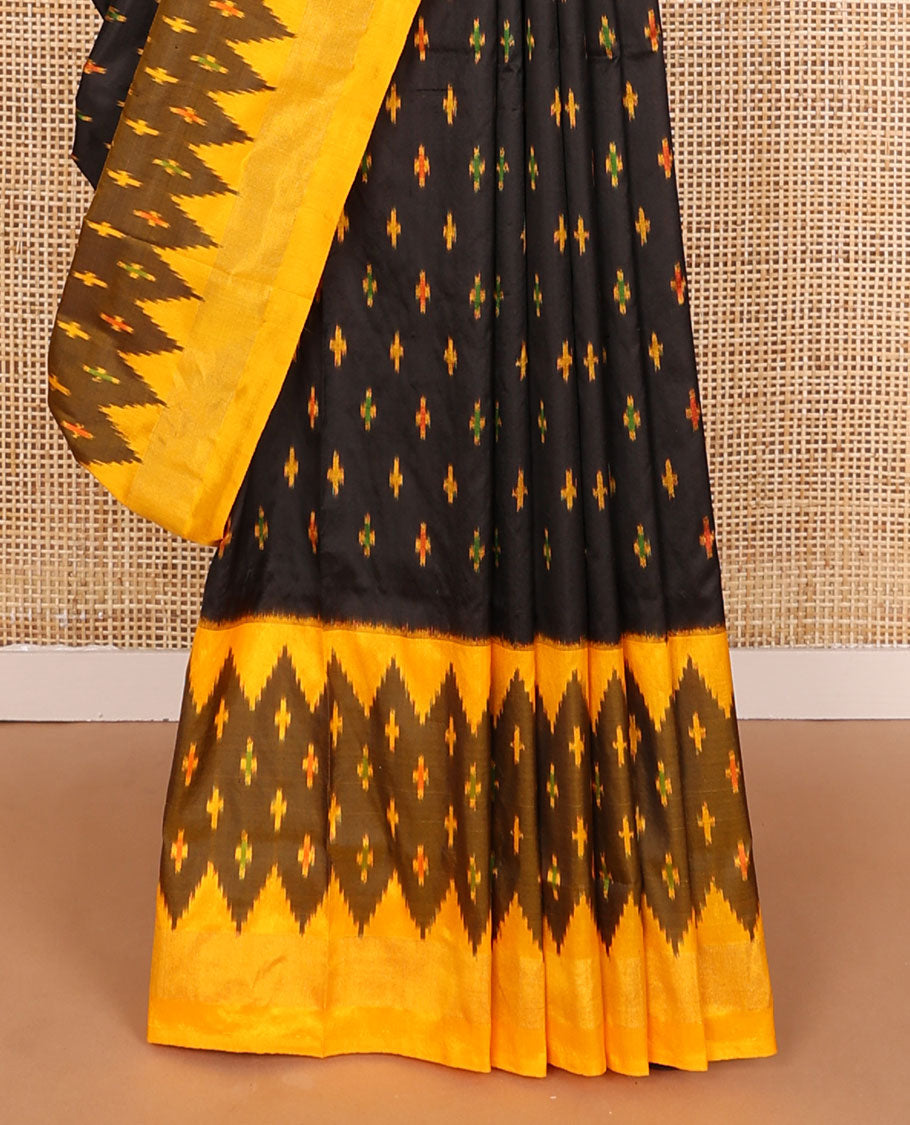 Black ikkat saree with ikkat buttas, contrast ikkat border & pallu of ikkat designs