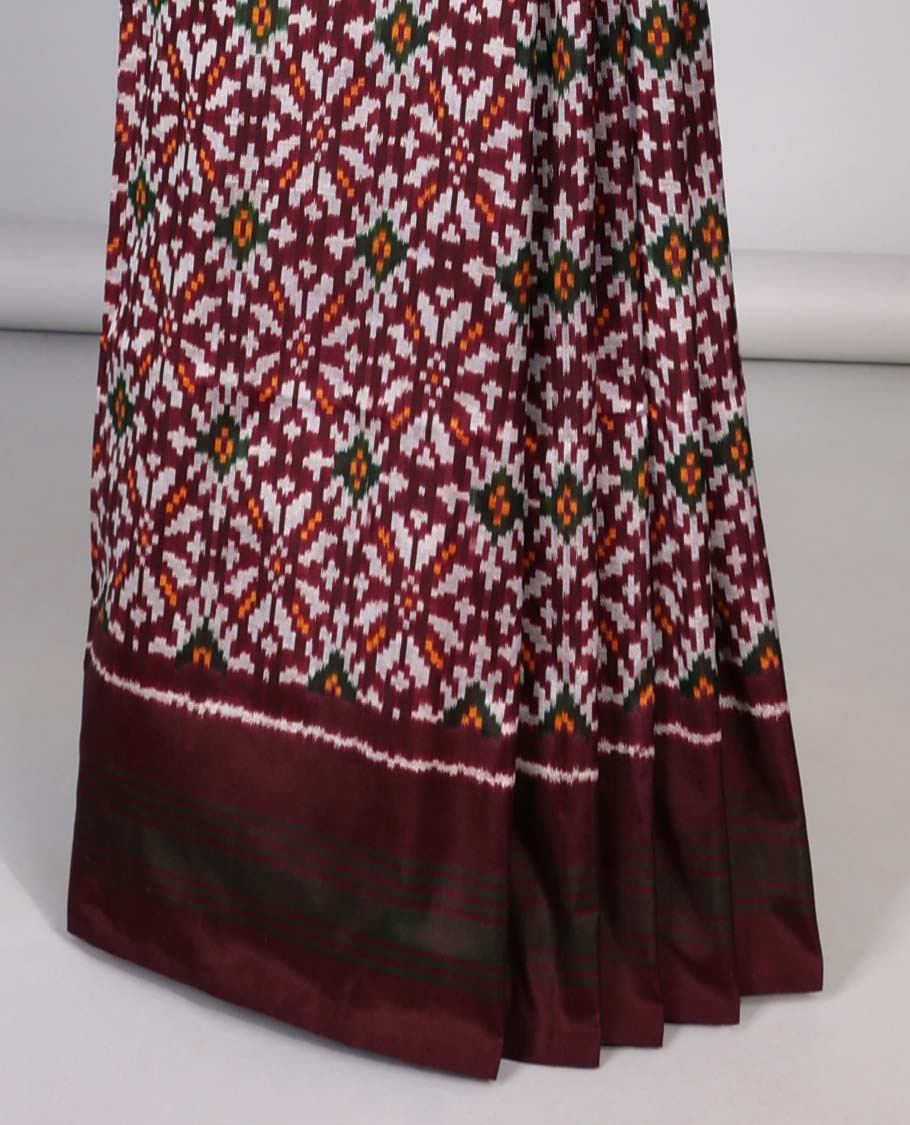 Brown floral design ikkat silk saree with self plain border & intricate design pallu