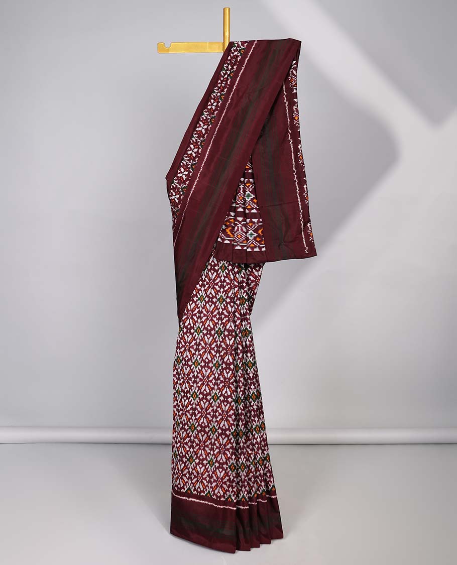 Brown floral design ikkat silk saree with self plain border & intricate design pallu