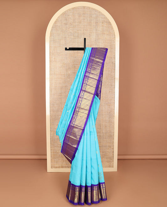 Blue floral design kancheepuram silk saree with contrast border of intricate zari design & floral vine design pallu