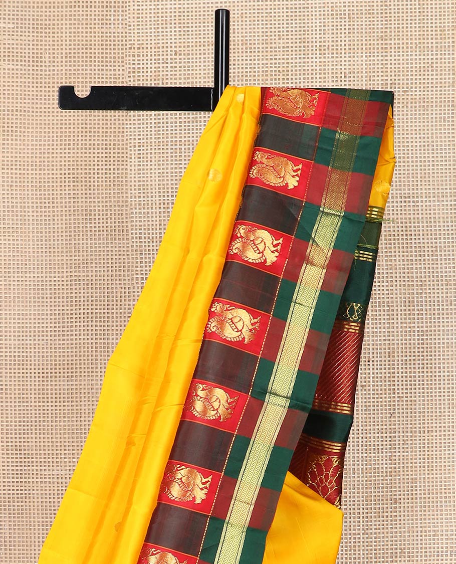 Yellow zari buttas kanchipuram silk saree, contrast thazampoo rekku multi-color checked one-sided zari border & zari design pallu