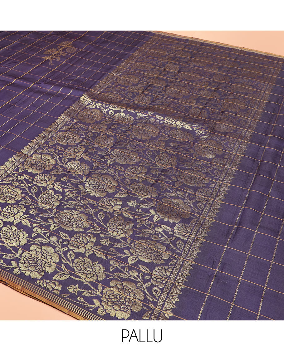 Blue Kanchipuram Silk Saree Highlighted with Floral Buttas Enclosed in Checks, Adorned with a Contrast Piping Border, Pallu Depicting Rose Florals in Zari, Saree Paired with a Matching Blouse