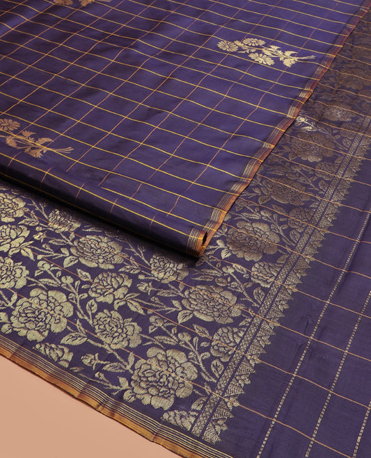 Blue Kanchipuram Silk Saree Highlighted with Floral Buttas Enclosed in Checks, Adorned with a Contrast Piping Border, Pallu Depicting Rose Florals in Zari, Saree Paired with a Matching Blouse
